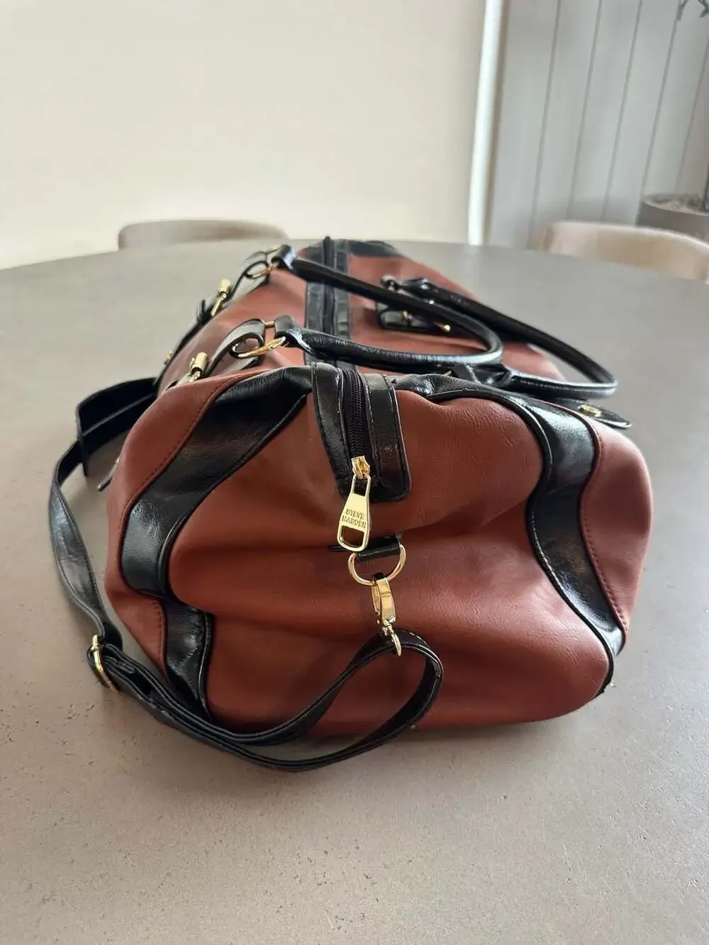 Steve Madden Two-Tone Brown and Black Faux Leather Weekender Duffel Bag